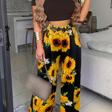 Load image into Gallery viewer, Bohemian Chic Two-Piece Outfit - Flowy Cropped Top with Vibrant Floral Wide Leg Pants - Shop &amp; Buy
