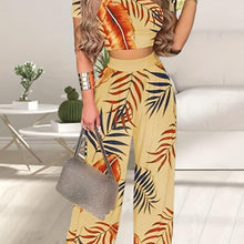 Load image into Gallery viewer, Bohemian Chic Two-Piece Outfit - Flowy Cropped Top with Vibrant Floral Wide Leg Pants - Shop &amp; Buy
