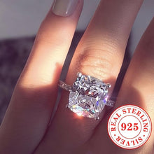 Load image into Gallery viewer, Dazzling Radiant Zircon Engagement Ring - Timeless Square-Embellished Design for Her - Shop &amp; Buy
