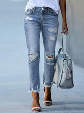 Load image into Gallery viewer, Women Fashion-Forward Ripped Distressed Jeans - Trendy Raw Hem, Washed Blue Hue - Shop &amp; Buy
